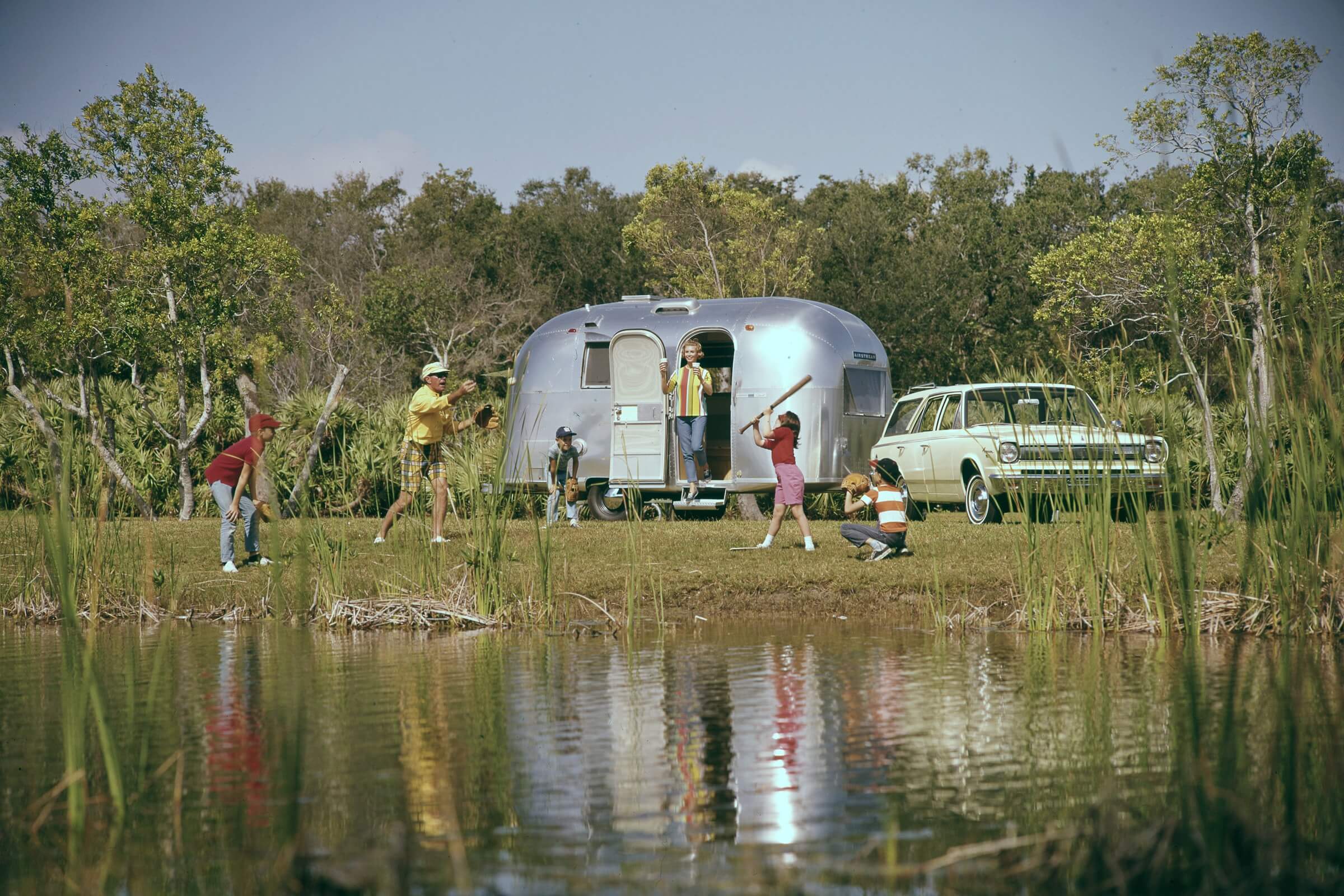 RV Park in Tyler, TX vintage airstream family by pond